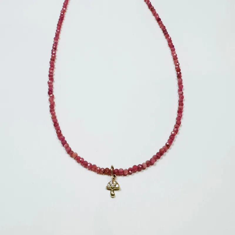 delicate mother of pearl necklace with mushroom charm sold by Theodosia