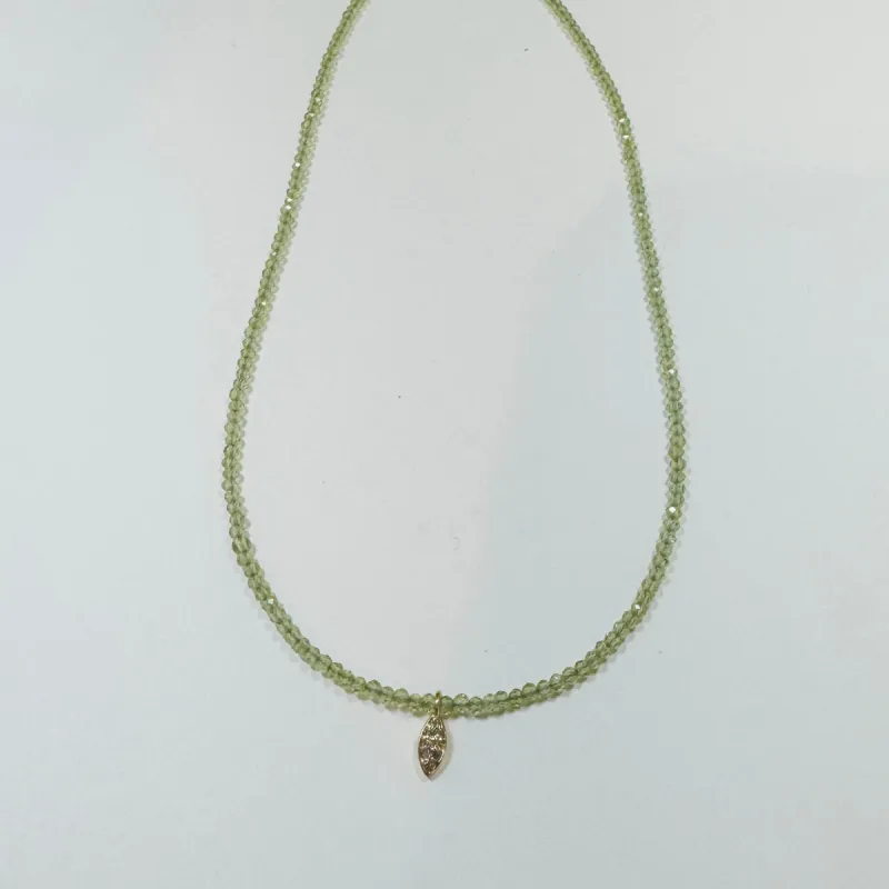 delicate peridot necklace with diamond charm sold by Theodosia