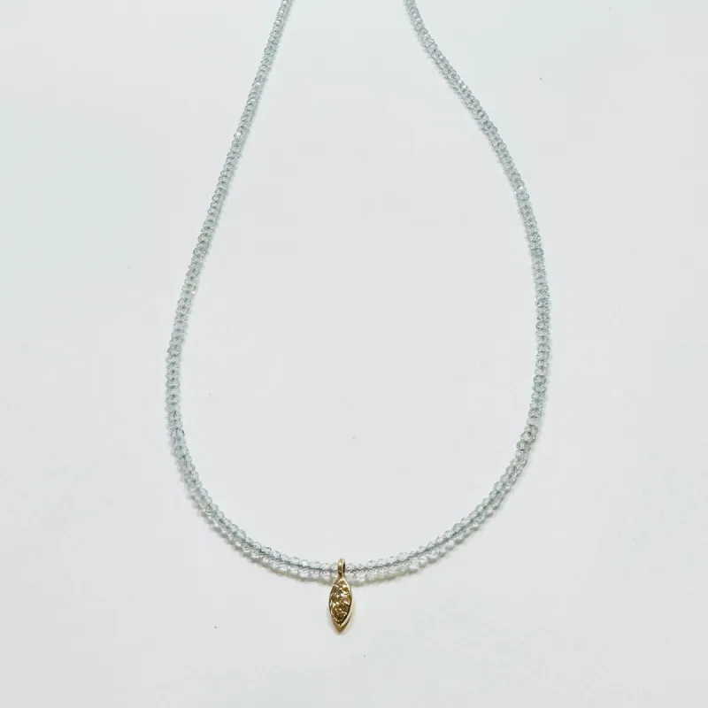 delicate topaz necklace with diamond charm sold by Theodosia