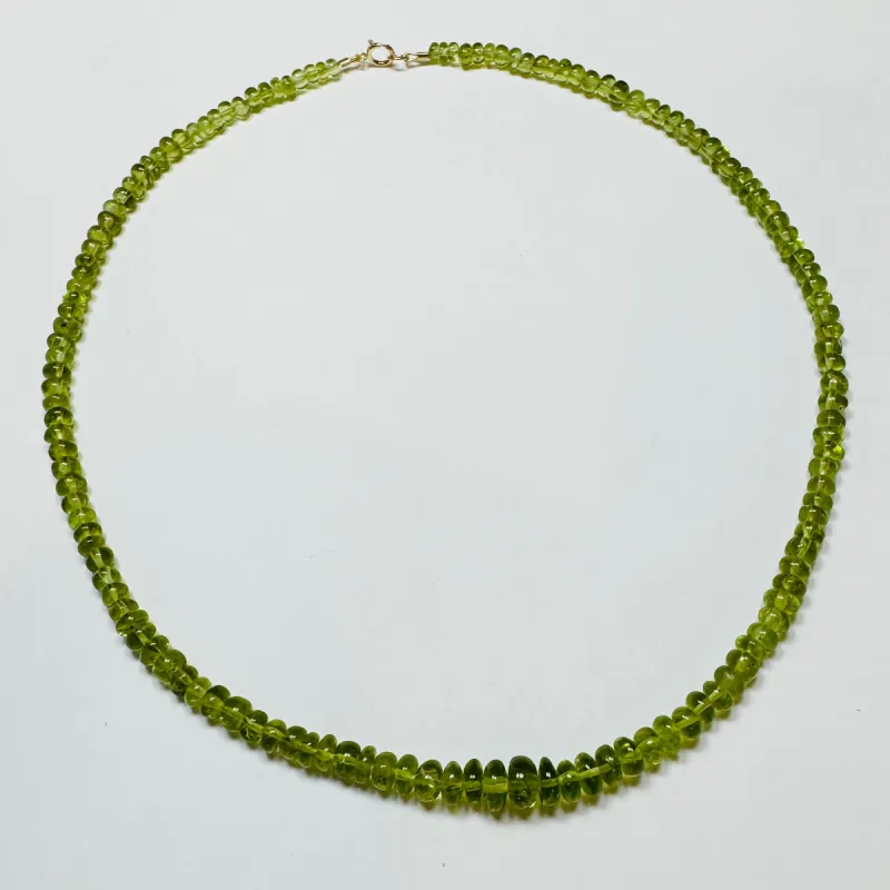 smooth graduated peridot necklace sold by Theodosia