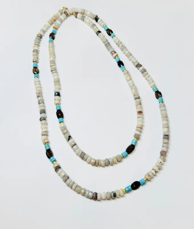 Australian opal, turquoise, smokey topaz, and gold layering necklace sold by Theodosia