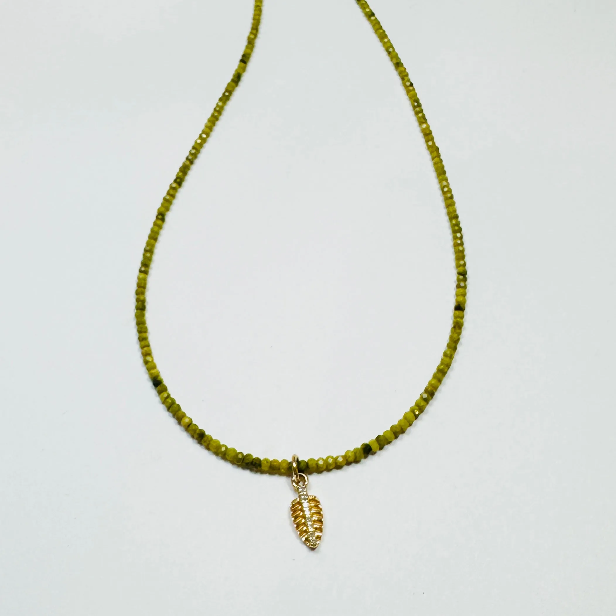 delicate green turquoise necklace with leaf charm sold by Theodosia