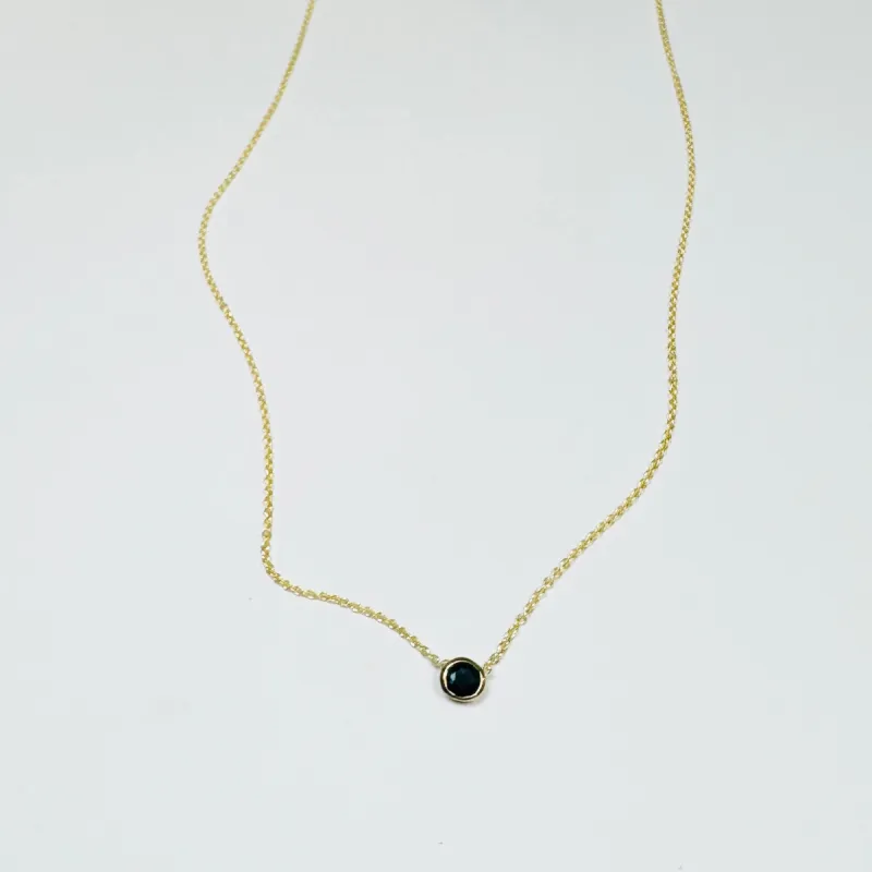 bezel set blue sapphire necklace sold by Theodosia