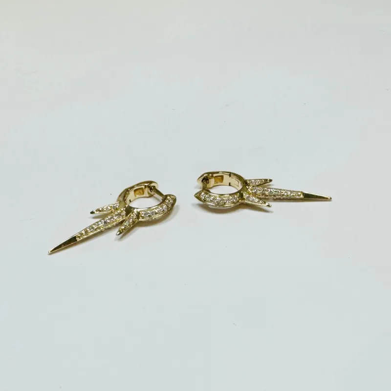 pave diamond spike huggie sold by Theodosia