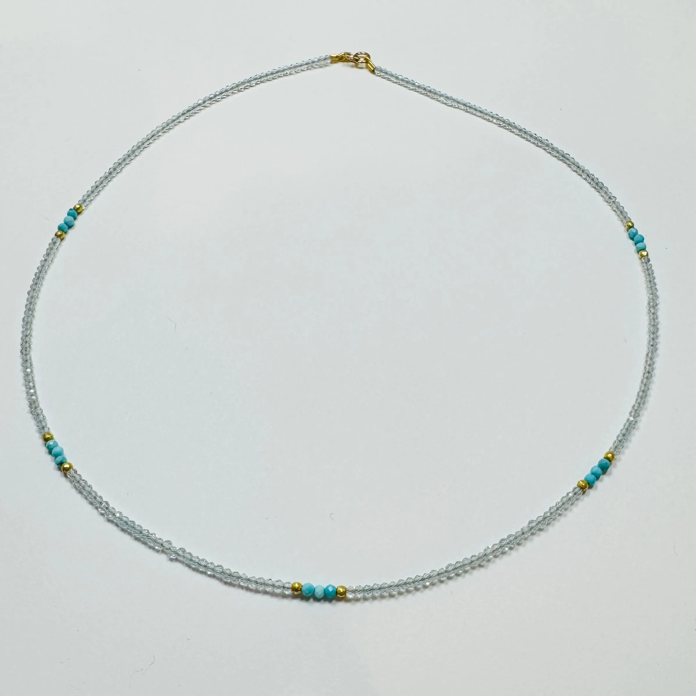 delicate blue zircon necklace with turquoise and gold nuggets sold by Theodosia