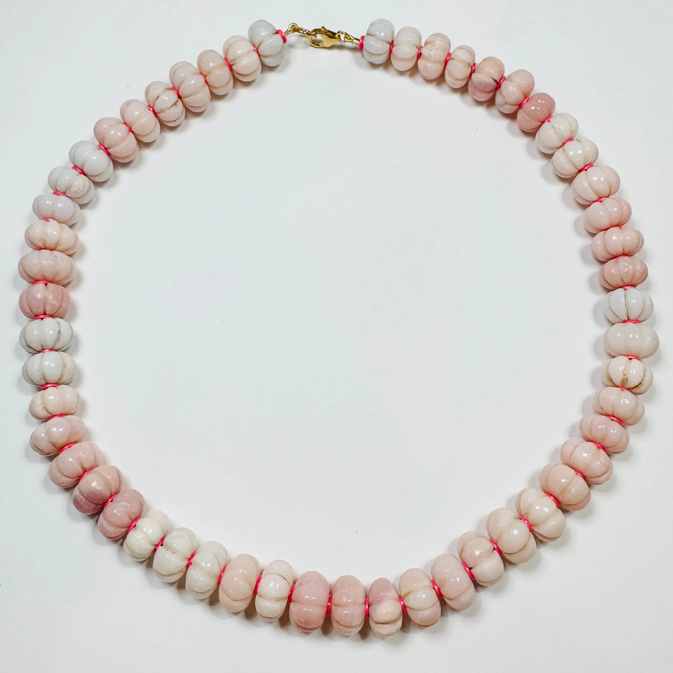 carved pink opal statement necklace sold by Theodosia