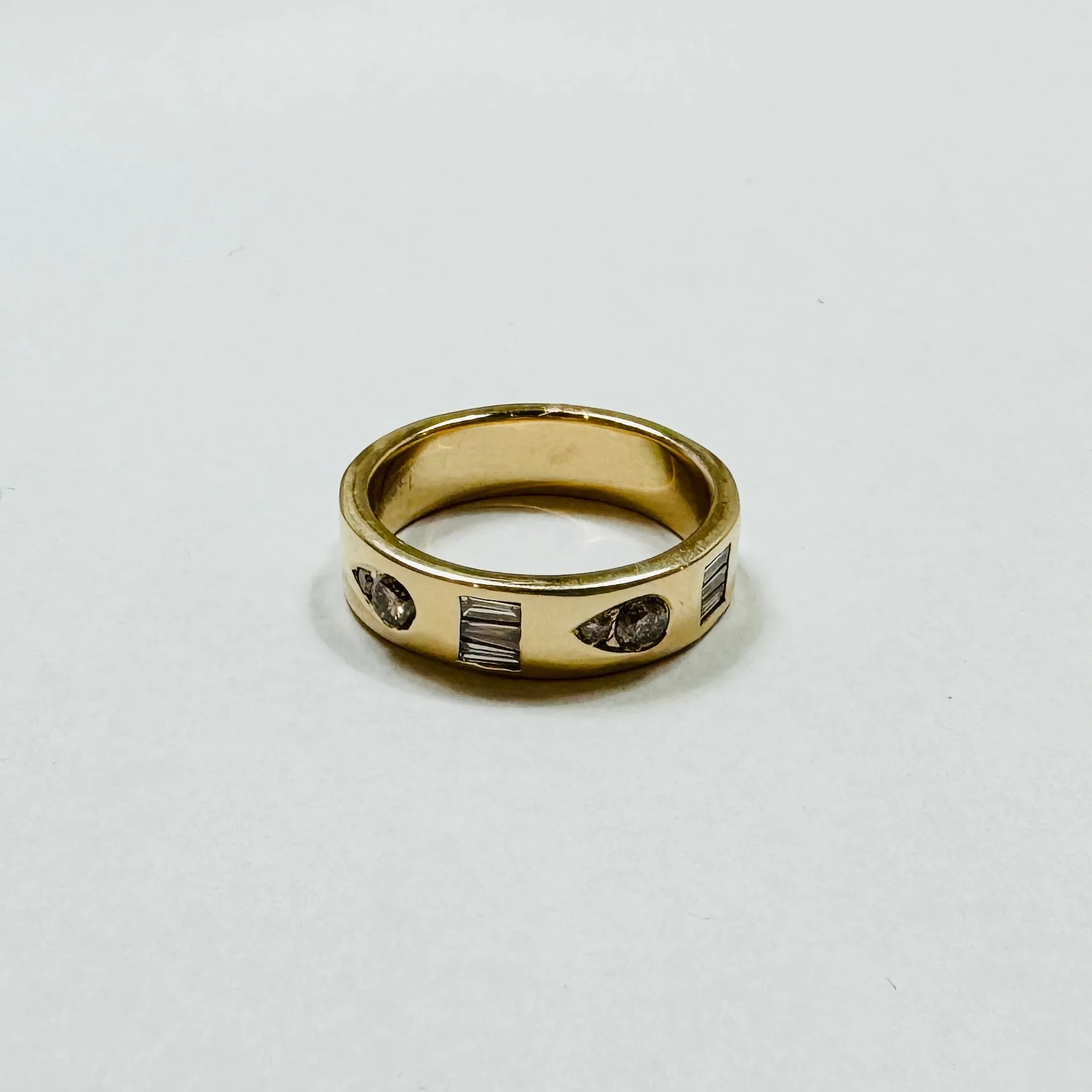 geometric illusion diamond band sold by Theodosia