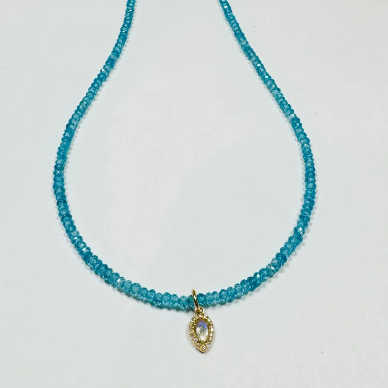 delicate blue appetite necklace with moonstone charm sold by Theodosia
