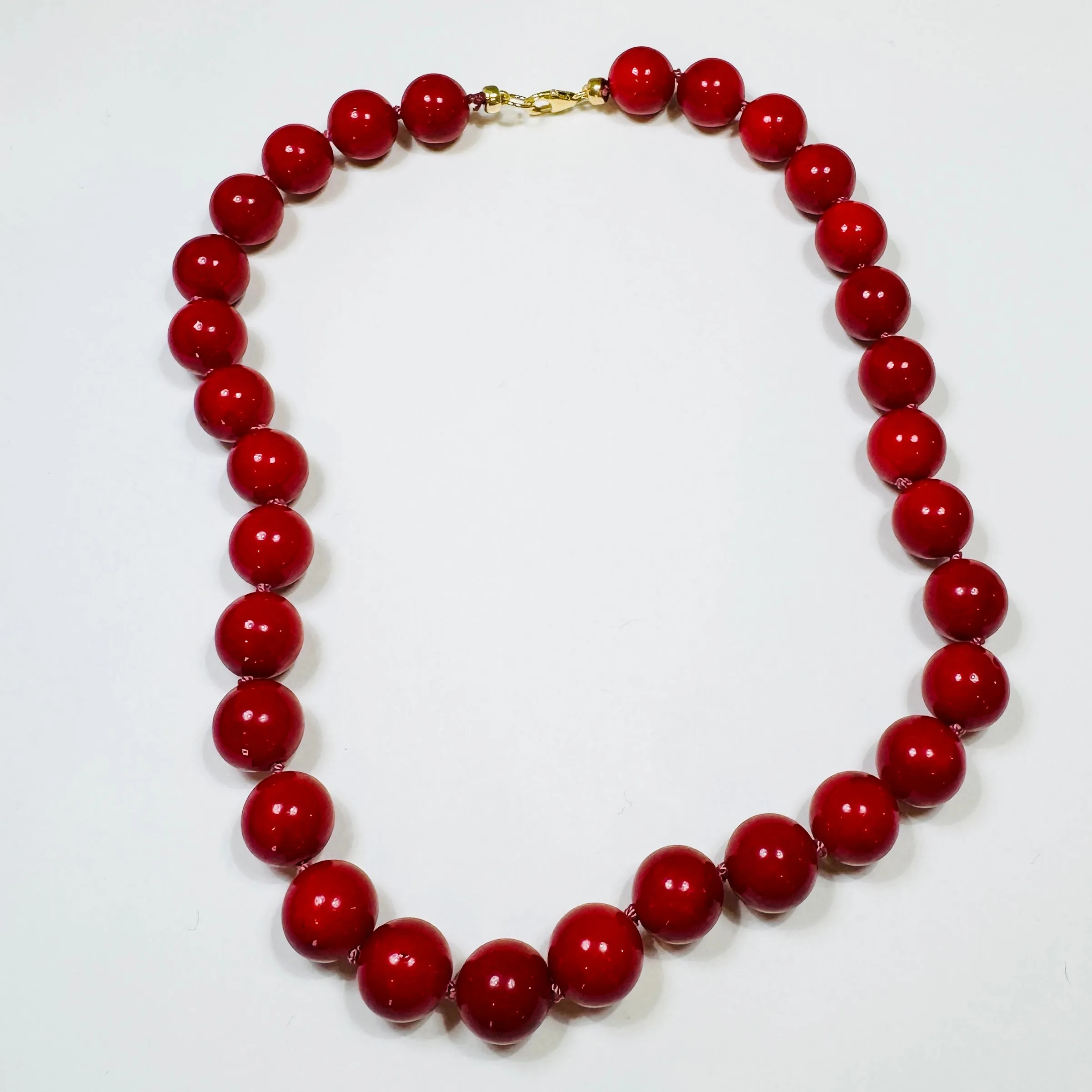 knotted red coral gumball sold by Theodosia