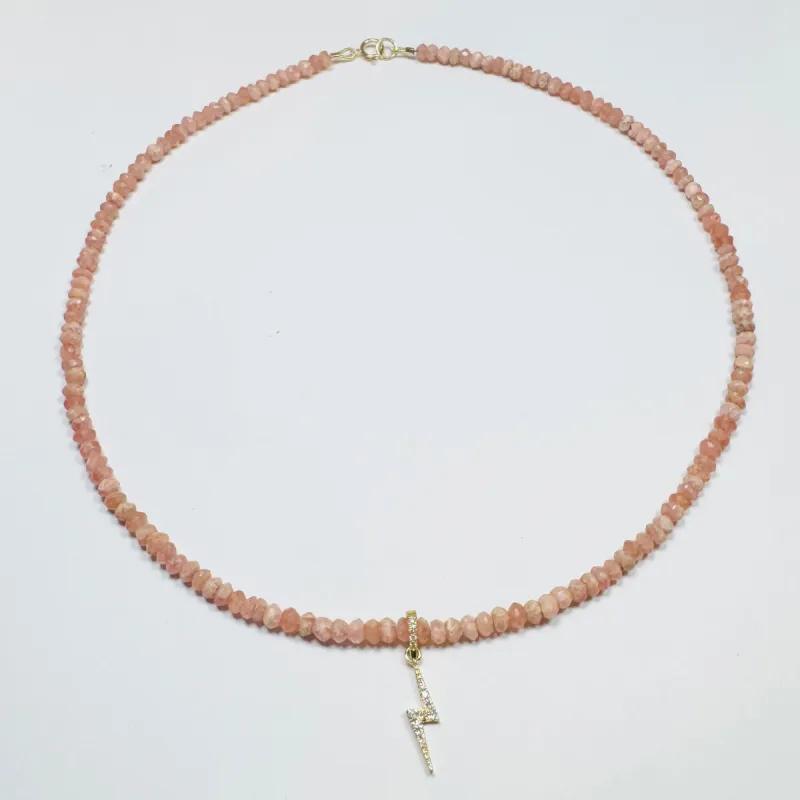 pink rhodochrosite necklace with lightning bolt charm sold by Theodosia