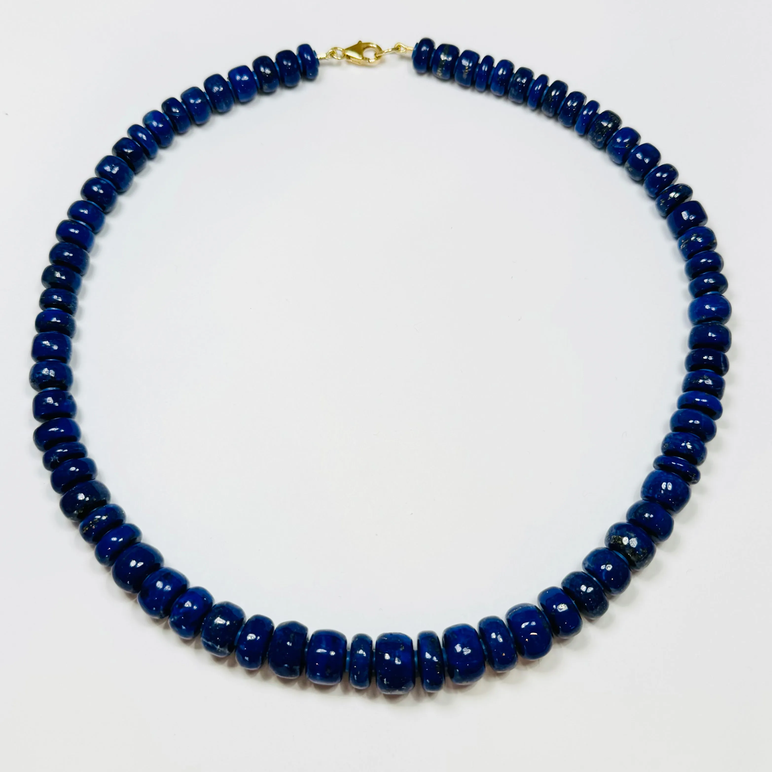graduated smooth lapis necklace with spacers sold by Theodosia