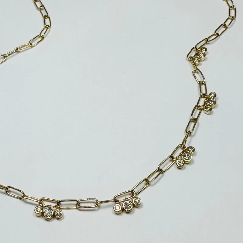 triple bezel set diamond necklace sold by Theodosia