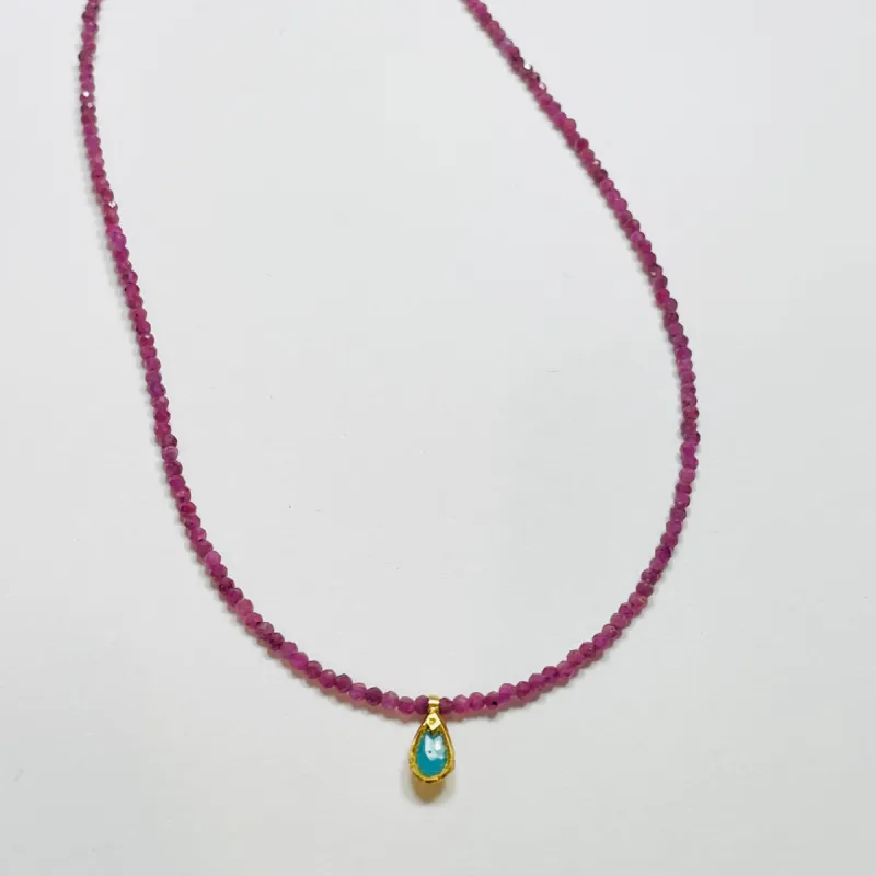 delicate ruby necklace with turquoise charm sold by Theodosia
