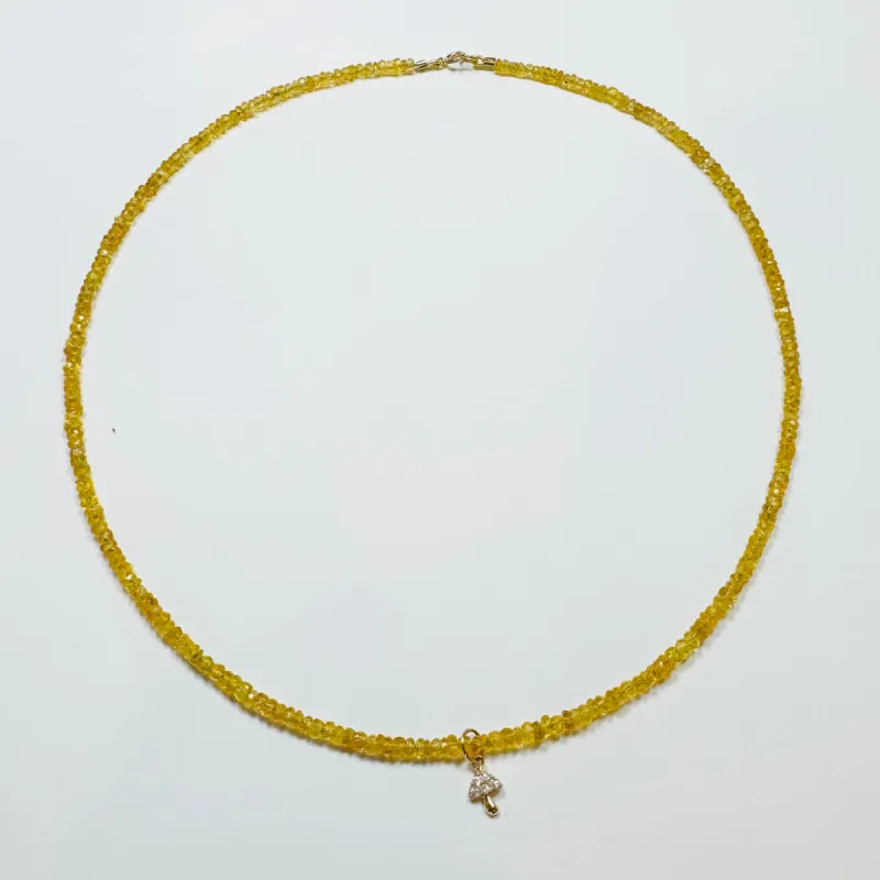 delicate yellow sapphire necklace with mushroom charm sold by Theodosia