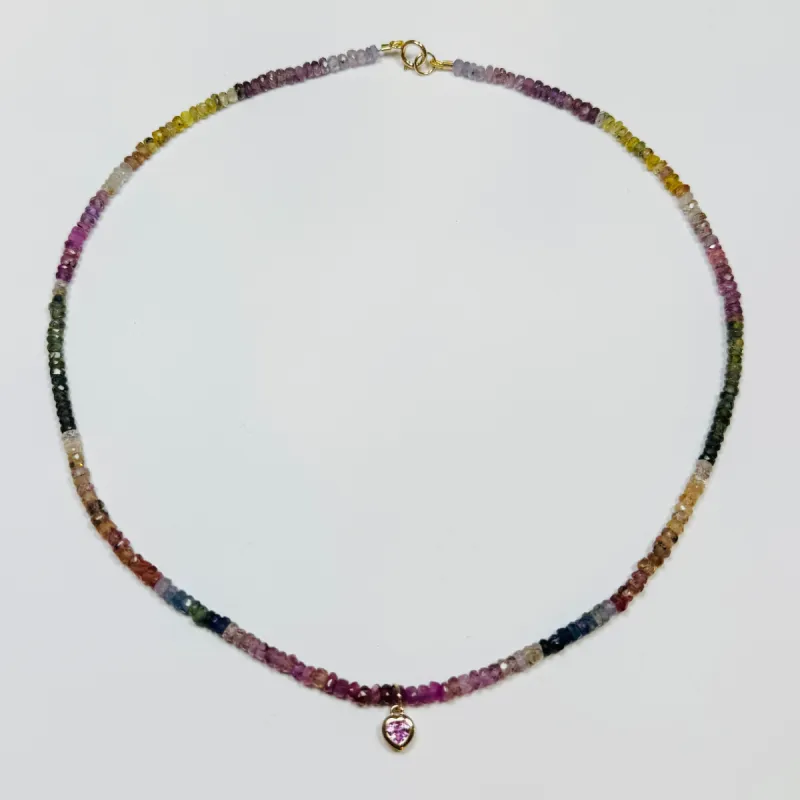 sapphire necklace with pink sapphire heart charm sold by Theodosia