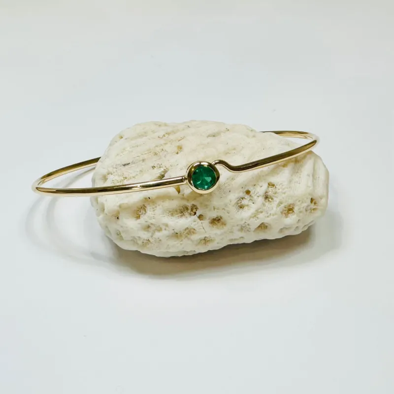 bezel emerald bangle sold by Theodosia