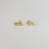 double flower studs sold by Theodosia