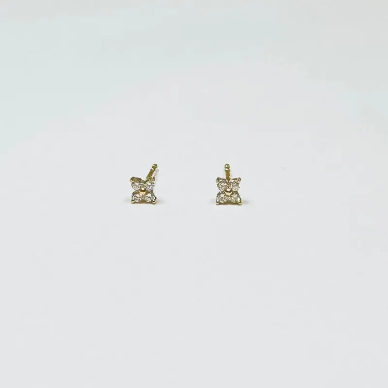 diamond flower studs sold by Theodosia