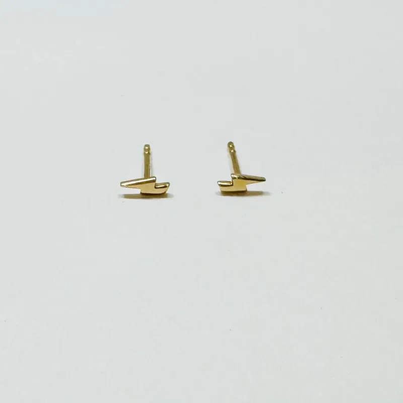 mini gold lightning bolt studs sold by Theodosia