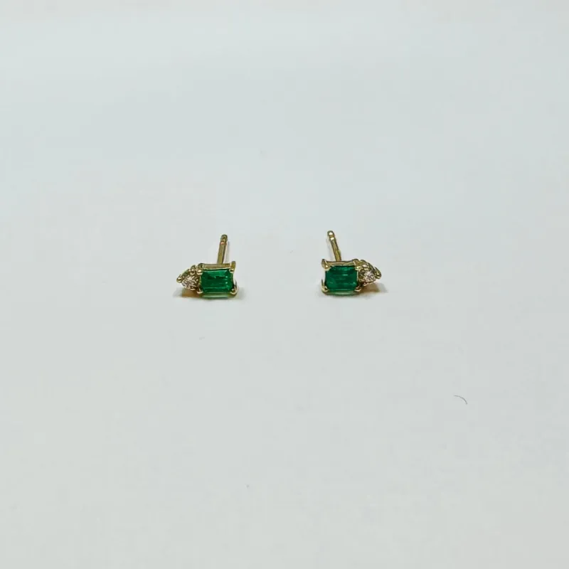 emerald baguette and diamond cluster studs sold by Theodosia