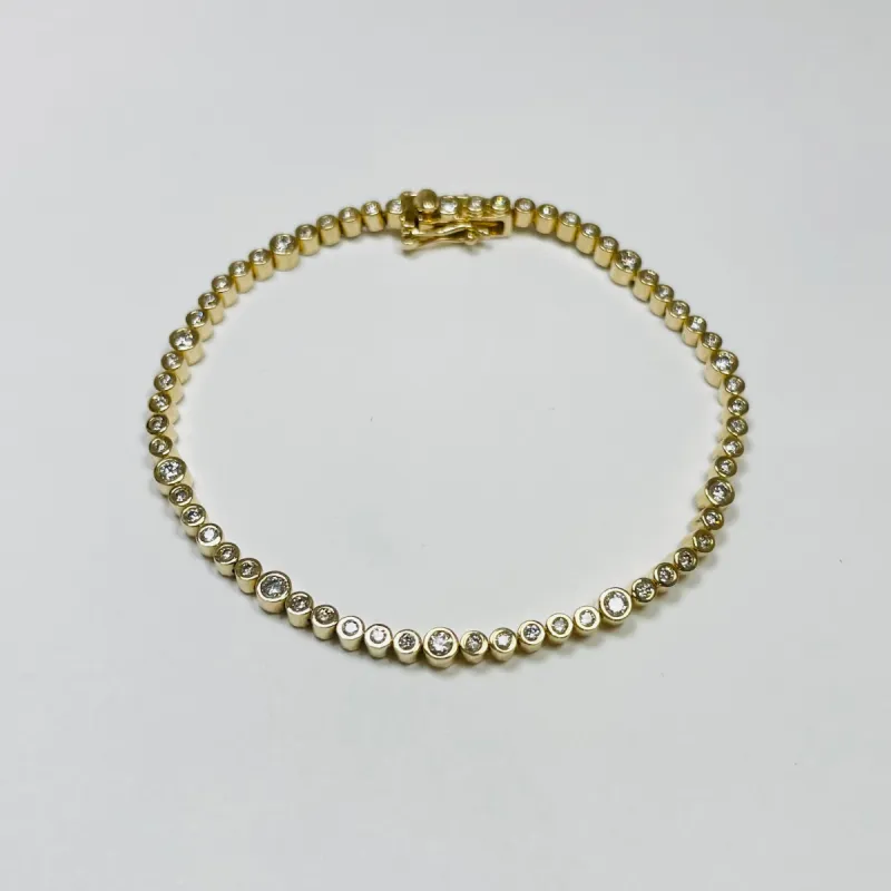 bezel set diamond tennis bracelet sold by Theodosia