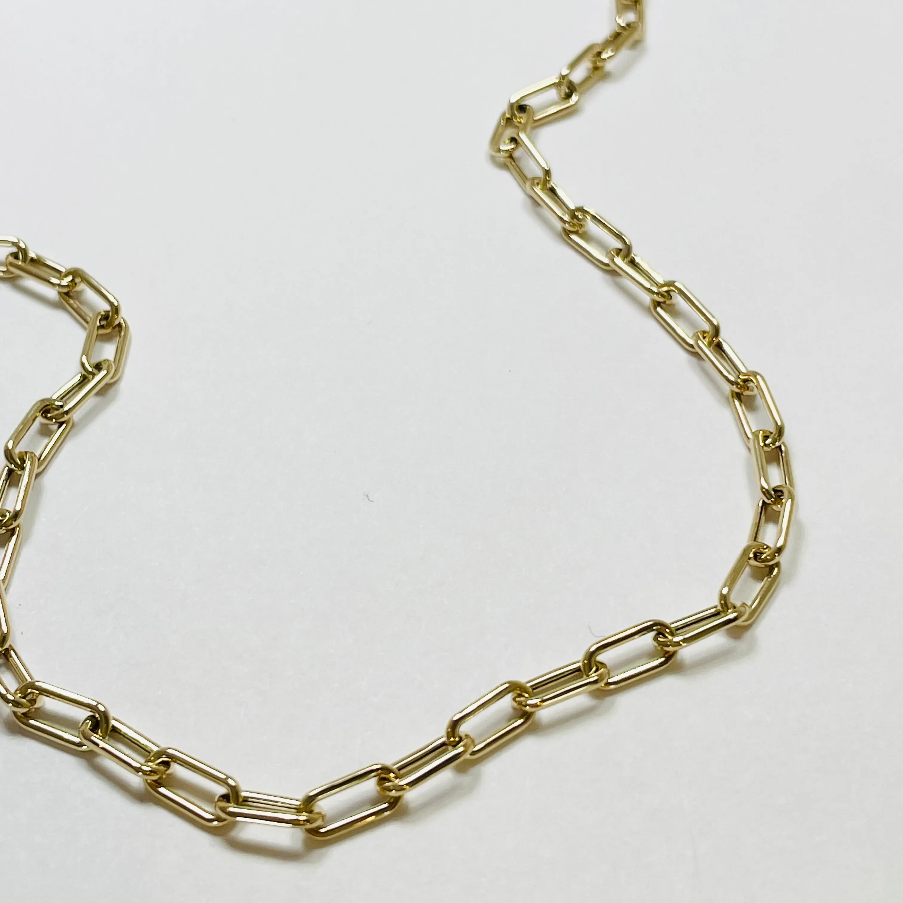 14k gold elongated rolo chain sold by Theodosia