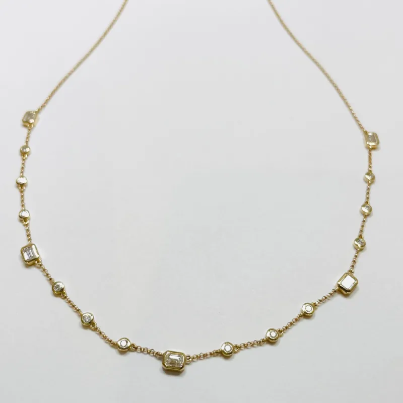 Emerald and brilliant cut diamond bezel set fringe necklace sold by Theodosia