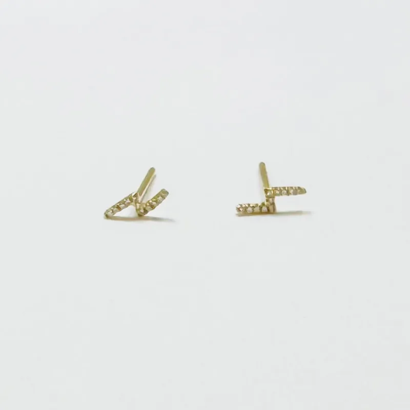 diamond lightning bolt studs sold by Theodosia