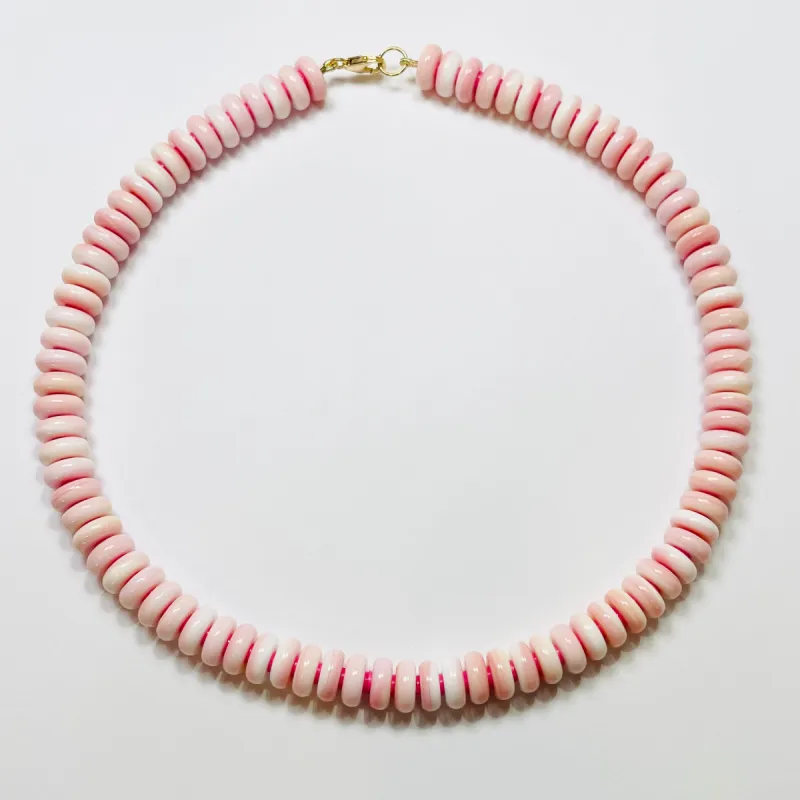 pink conch necklace with spacers sold by Theodosia
