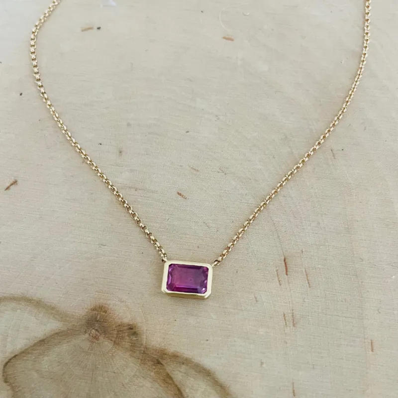 Pink sapphire bezel set necklace sold by Theodosia