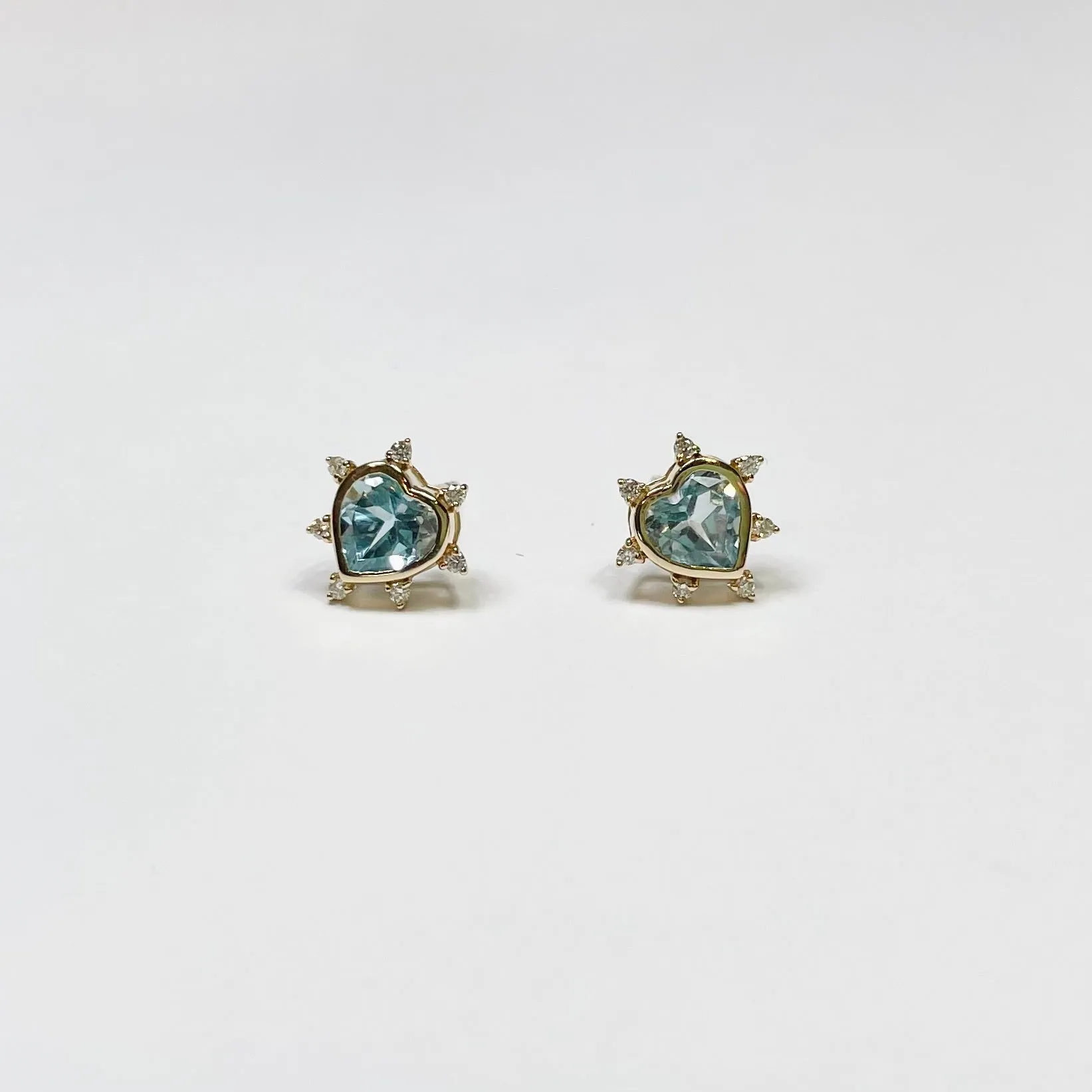 spike heart studs, blue topaz sold by Theodosia