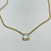 stepped bezel set topaz necklace sold by Theodosia