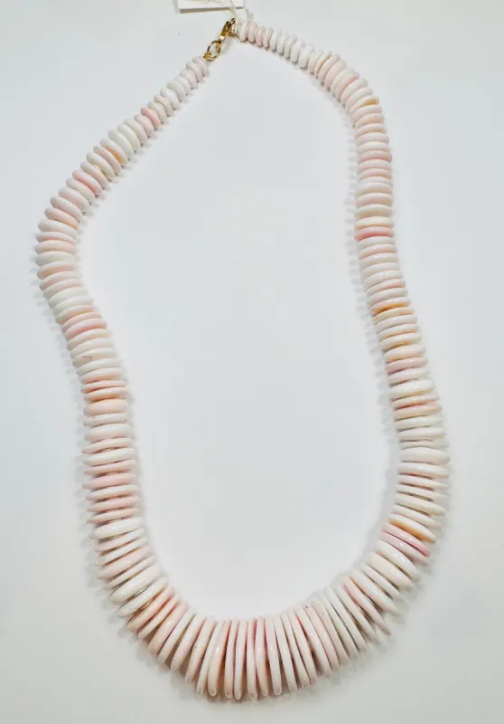 queen conch necklace sold by Theodosia