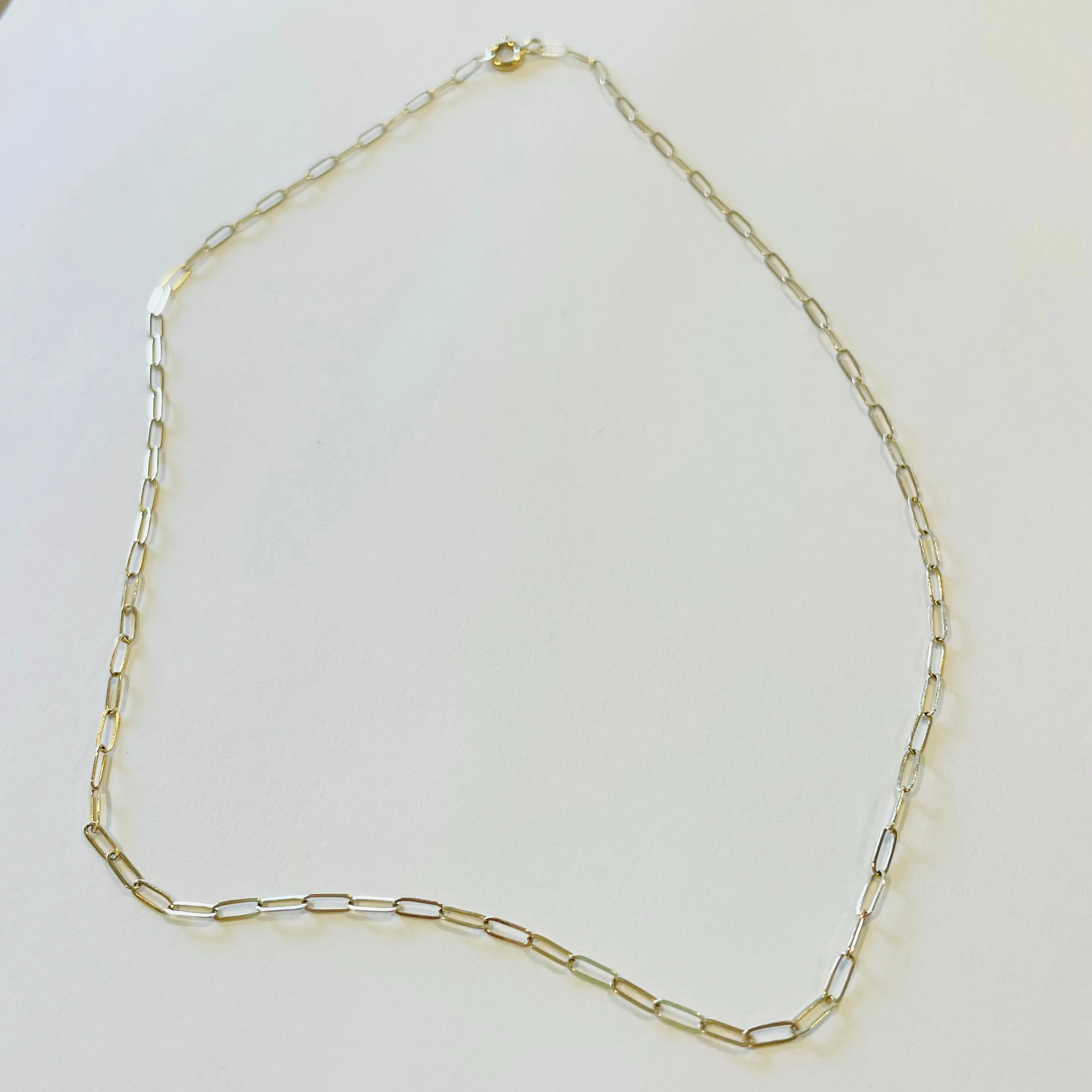 14k gold 2x4 mini paperclip chain sold by Theodosia