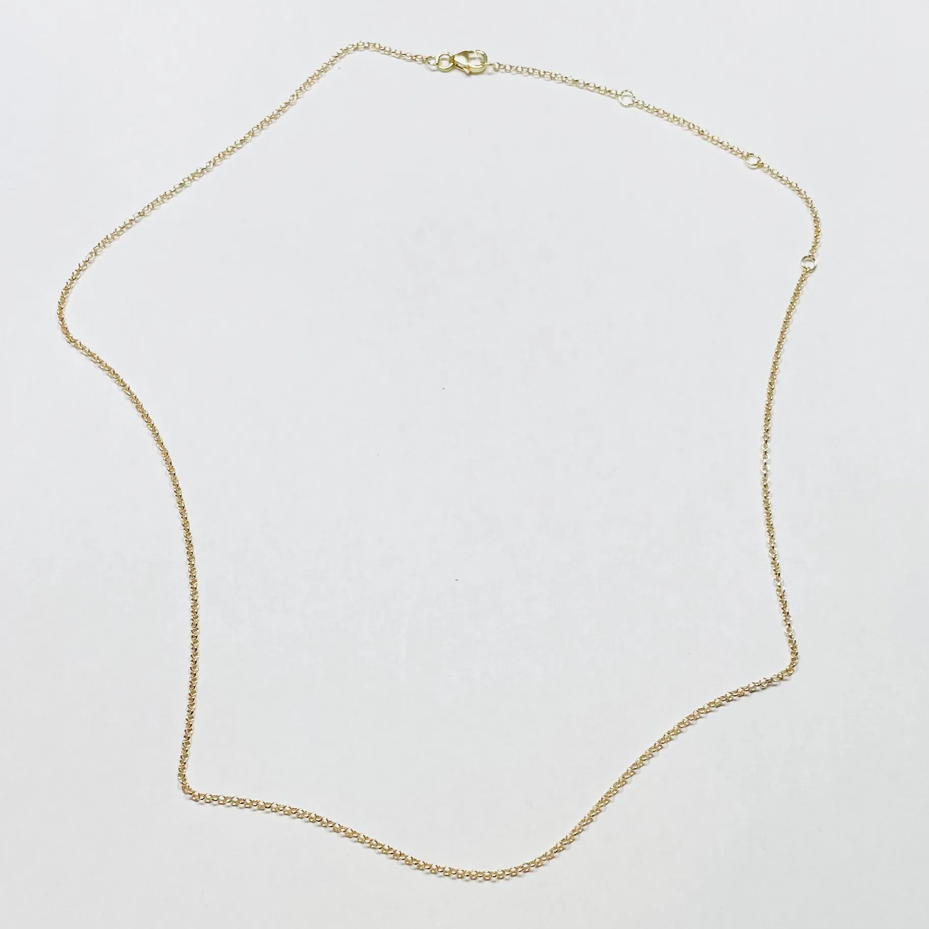 14k gold 1 mm curb chain sold by Theodosia