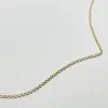 14k gold 1 mm curb chain sold by Theodosia