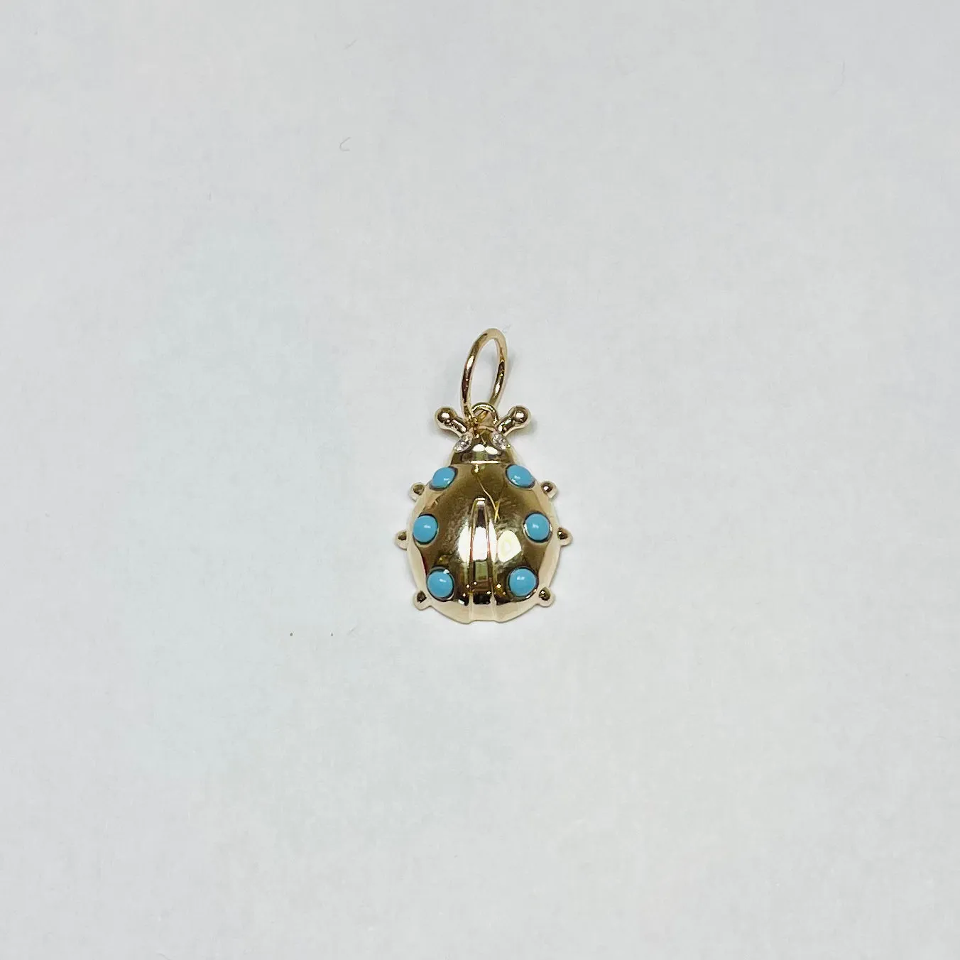ladybug pendant sold by Theodosia
