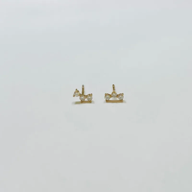 curved diamond bar studs sold by Theodosia