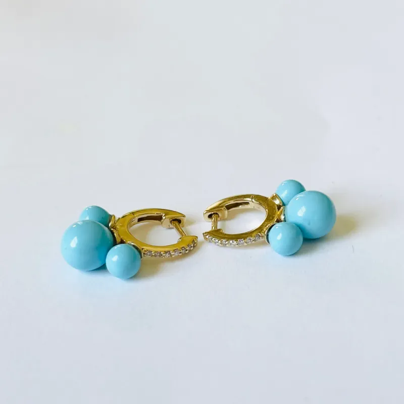 Gold Diamond and Turquoise Huggies sold by Theodosia