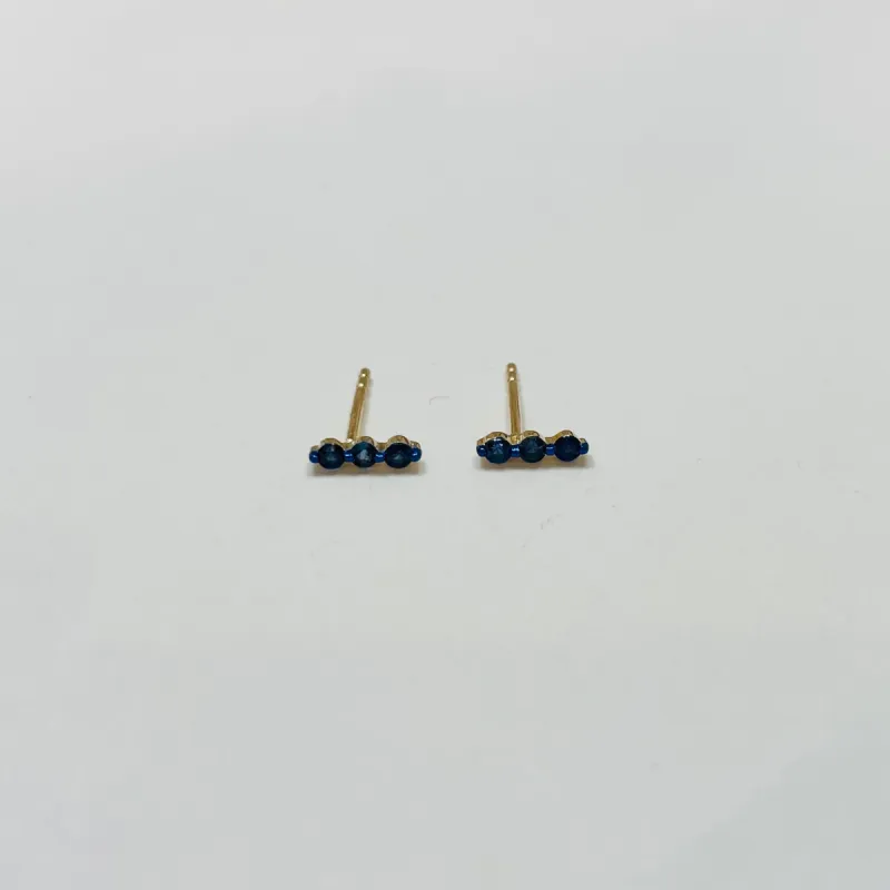 blue sapphire floating bar studs sold by Theodosia