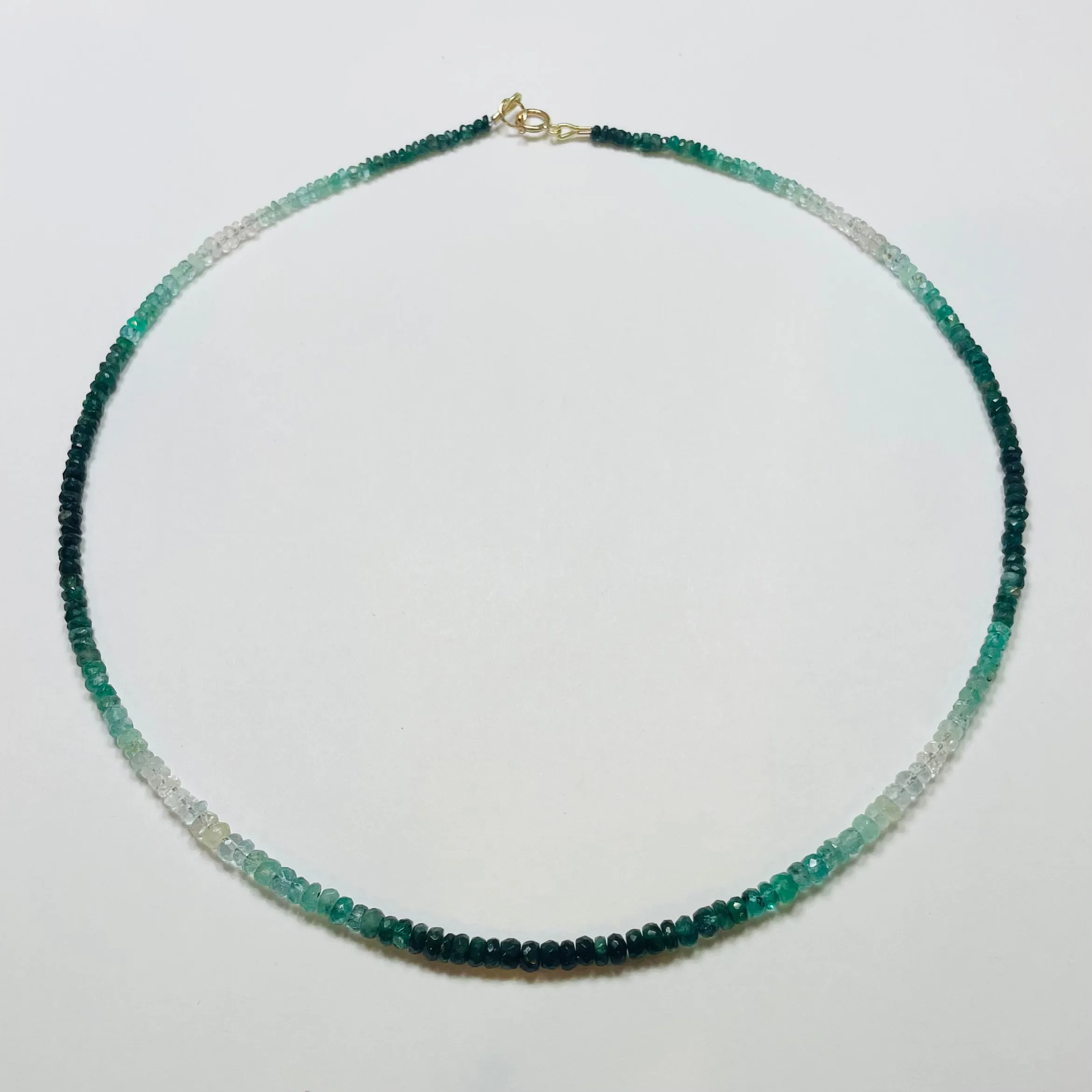 shaded emerald heishi cut necklace sold by Theodosia