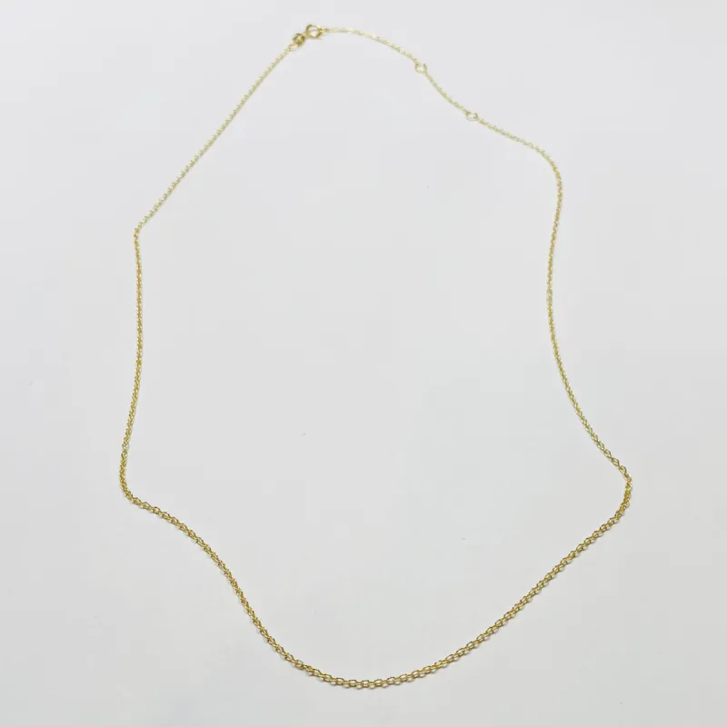 14 kt gold micro rolo chain sold by Theodosia