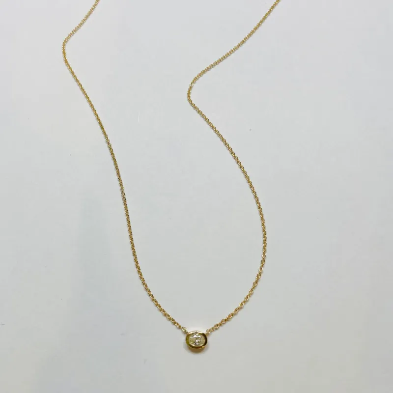 oval bezel set diamond necklace sold by Theodosia