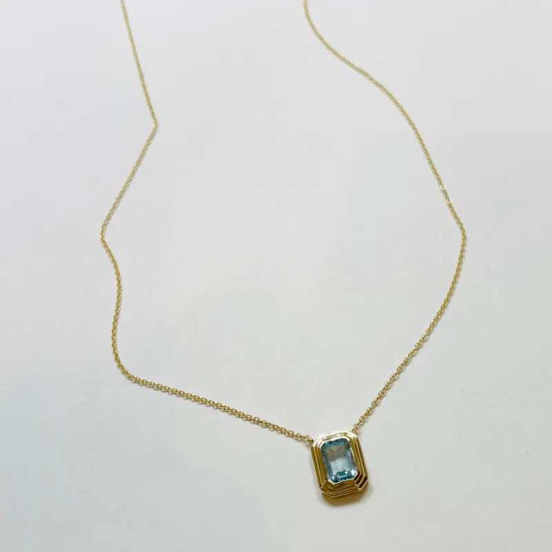 stepped bezel set blue topaz necklace sold by Theodosia