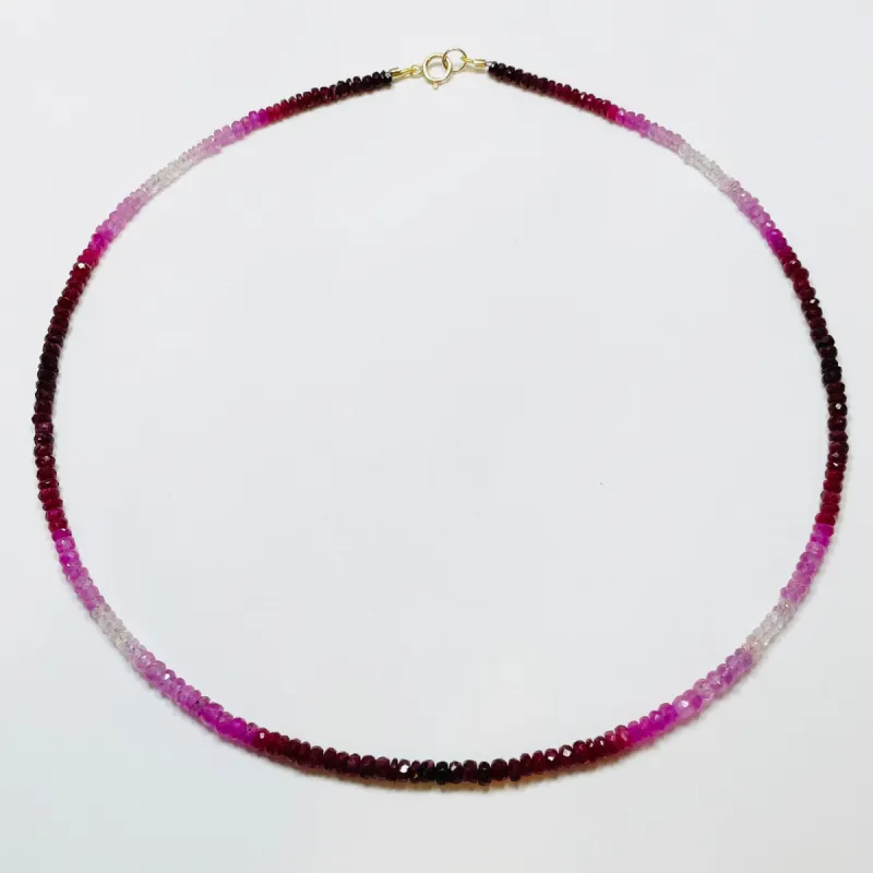 shaded ruby heishi cut necklace sold by Theodosia