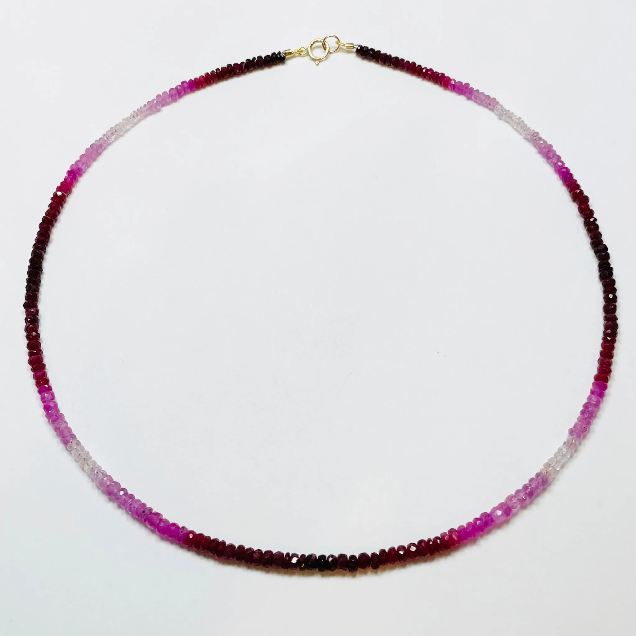 shaded ruby heishi cut necklace sold by Theodosia