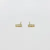 bezel set geometric diamond bar studs sold by Theodosia