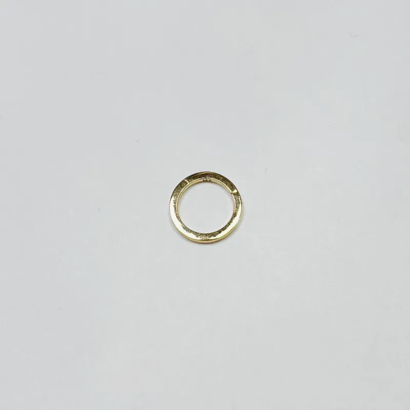 gold flat round connector sold by Theodosia