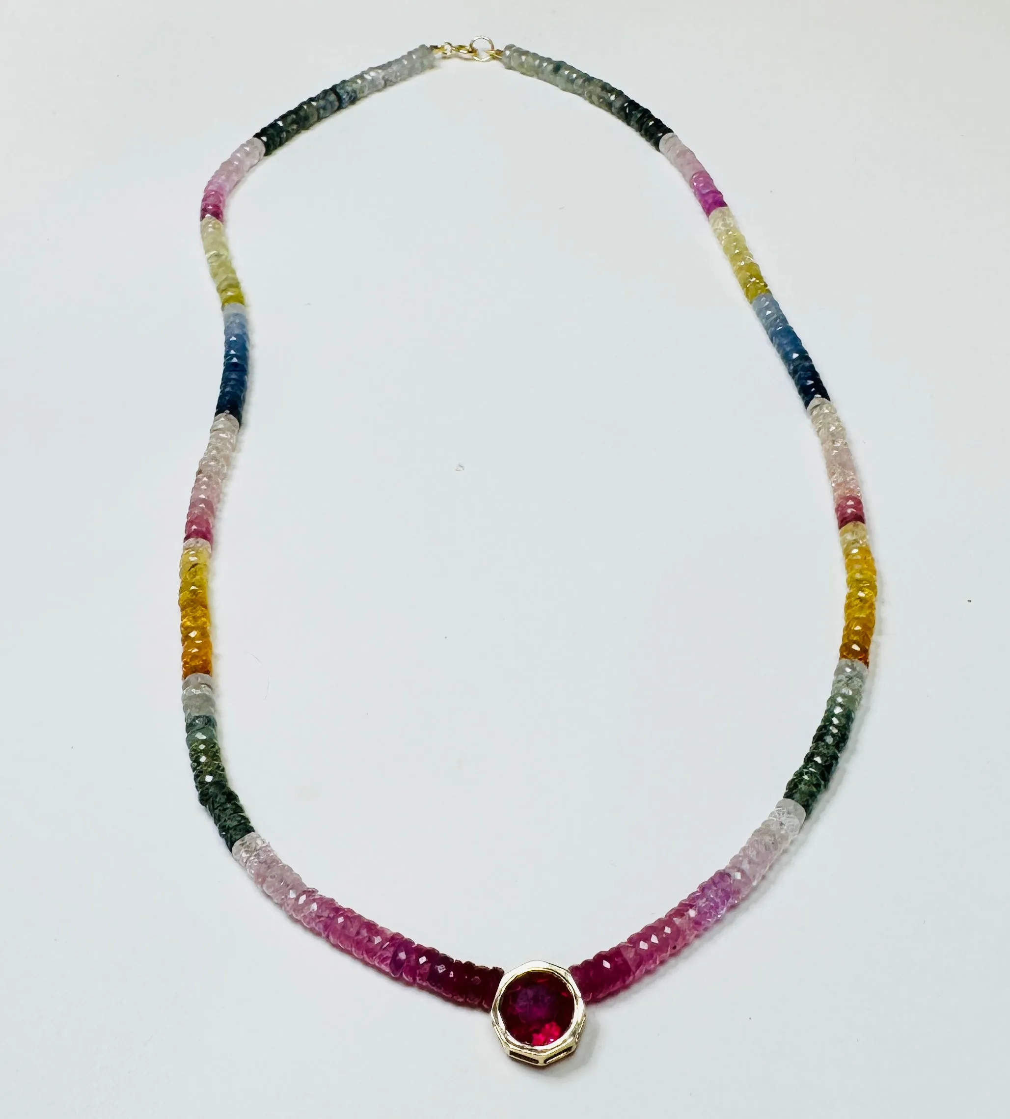 sapphire heishi necklace with ruby sold by Theodosia