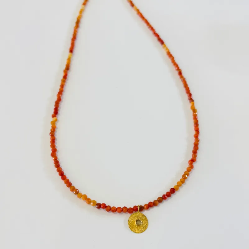 delicate shaded carnelian necklace with disc charm sold by Theodosia